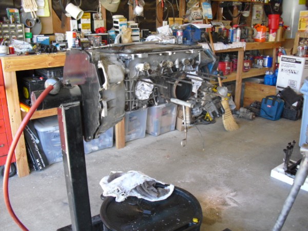 My other engine stand has a special Bell housing plate   with a starter cut out, you can run engines on this stand as well but I use it when I need to turn a engine upside down, here I am installing time serts in the top studs and have the engine upside down so the shavings fall out.